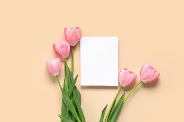 Blank card with beautiful pink tulips on beige background. Mother's Day celebration