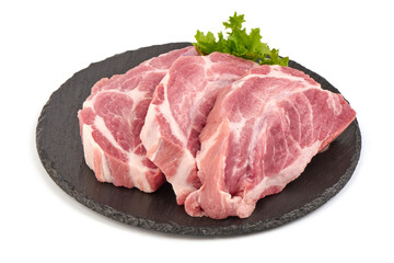Raw pork shoulder butt steaks, isolated on white background.