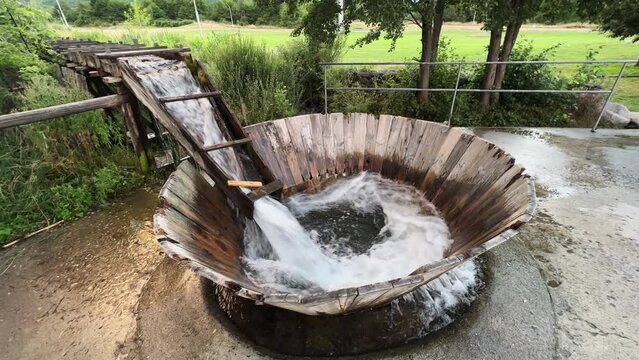 The water flow down the slide in vintage swirl washing machine