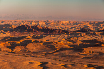 Sunset in the Negev desert. Makhtesh Ramon Crater - obrazy, fototapety, plakaty
