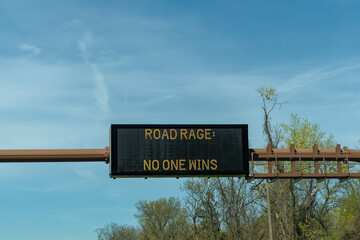 electronic road sign says Road Rage No One Wins