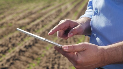 Businessman digital agricultural farmer with tablet. Hands palms use gadget tablet check current data on weather prices for agricultural products new technologies access to useful business information