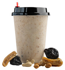 A glass mixed dry fruits and nuts milk shake