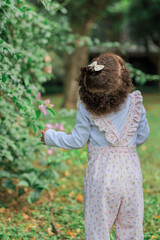 Little girl playing outdoors