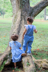 Sibilings playing outdoors