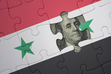 puzzle with the national flag of syria and usa dollar banknote. finance concept - obrazy, fototapety, plakaty