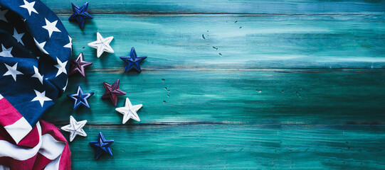 Colorful Fourth of July Background. American flag and red, white and blue stars over a rustic wood...