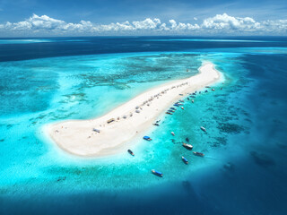 Aerial view of Nakupenda island, sandbank in ocean, white sand, boats, yachts, blue sea during low...