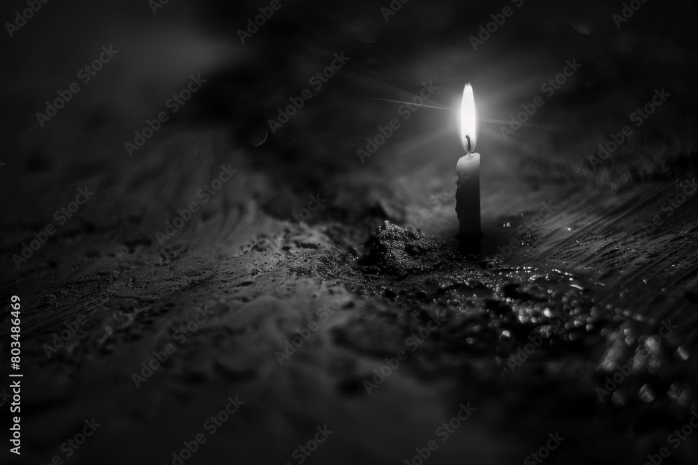 Canvas Prints the struggle of a small, fragile light surrounded by overwhelming darkness, symbolizing hope or posi