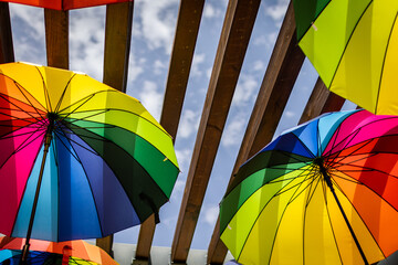 Many colorful umbrellas. Umbrella in the air.