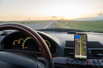 Phone navigator in car, travel concept