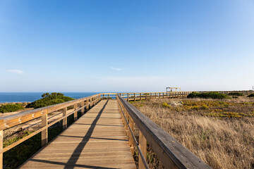 Fototapeta na wymiar Boardwalk walkway in Lagos, Algarve, Portugal. October 10, 2023.