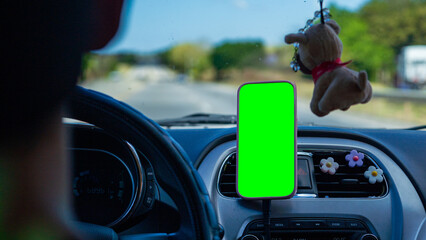 car driving on the road with chroma key smartphone