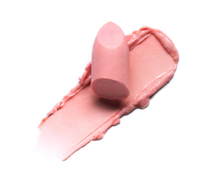 Pink lip balm stick bullet texture isolated on white background. Smudged skincare cosmetic product smear. Makup skin care swatch product sample