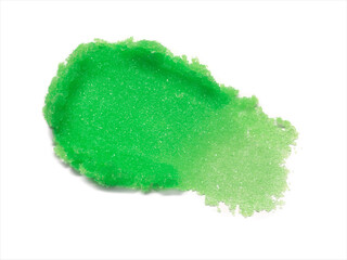 Green lip scrub texture isolated on white background. Smudged cosmetic product smear. Makup swatch product sample