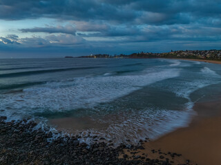Aerial sunrise views over Bombo Beach at Kiama