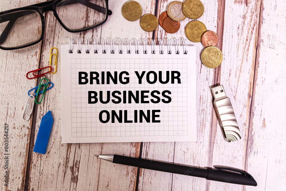 Poster notebook with text bring your business online.