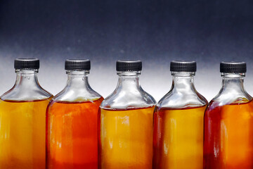 Close up of glass bottle with liquid