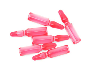 Glass ampoules with liquid isolated on white, top view