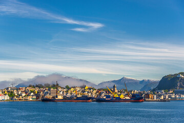 view of the city of Alesund shrouded in fog, Norway