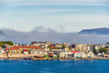 view of the city of Alesund shrouded in fog, Norway