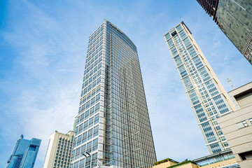 Obraz premium Skyscrapers and office building with blue sky