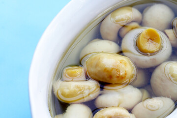 Champignon mushrooms in brine. Canned champignon mushrooms whole