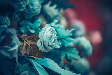 Artificial flowers as a background; Flower texture background