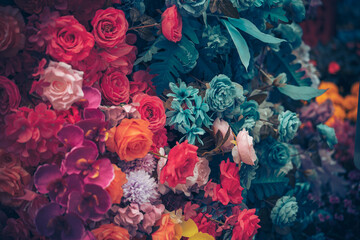 Artificial flowers as a background; Flower texture background