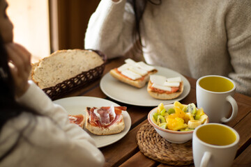 Spanish breakfast with serrano ham and fruit at home.