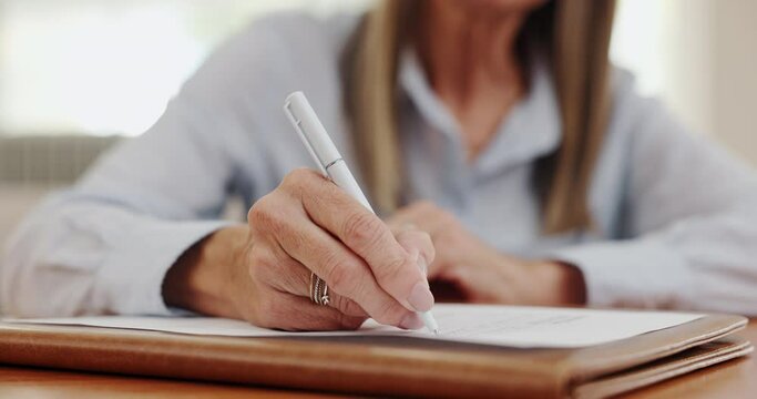 Application, hands writing and retirement home document with tabe and checklist for agreement. Paperwork, person and registration for accommodation with information for policy and healthcare survey