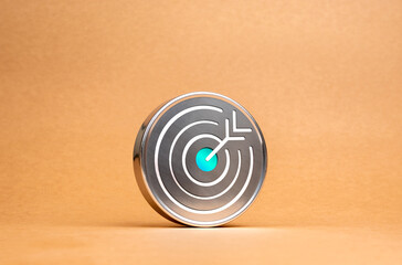 Target dart icon on circle chrome badge on brown recycled paper background, minimal style. Business...