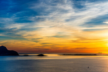  top view of a sunset over The city of Alesund and the sea during a sunny evening, Norway