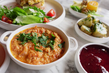 Turkish Menemen omelet in a frying pan. .