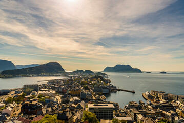 top view of a sunset over The city of Alesund and the sea during a sunny evening, Norway