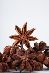 Star anise spice creative atmosphere on white background