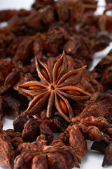 Star anise spice creative atmosphere on white background