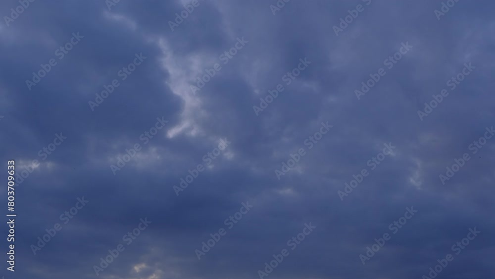 Wall mural dramatic sky with storm cloud on a cloudy day time lapse.