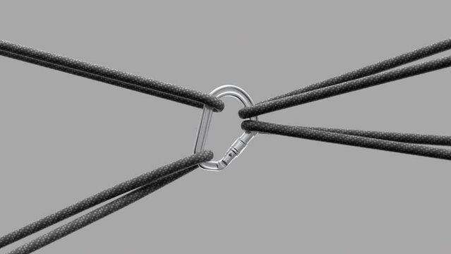 Climbing carabiner safety check, closeup of ropes secured by professional climbing equipment. 