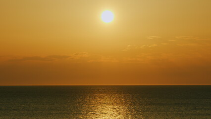 Beautiful Sunset Above Sea. Sunrays Flickering In Ripples On Water Surface. Natural Sky Reflects In...