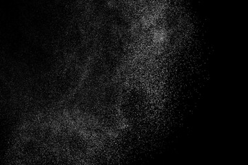 White texture on black backdrop. Abstract splashes of water on dark background. Light clouds...
