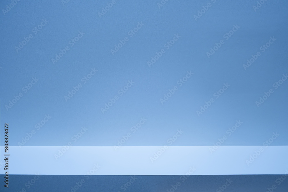 Aufkleber Wall interior background, studio and backdrops show products. with soft light shadow from window color blue and white. background for text insertion and presentation of product	
