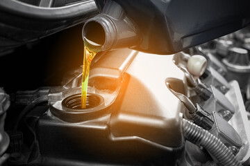 Refueling and pouring oil quality into the engine motor car Transmission and Maintenance Gear...