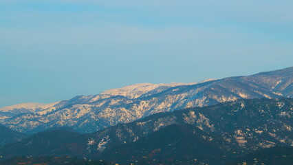Mountain Range And Layers Of Blue Hill Mountains. Mountain Sky And Land Landscape.