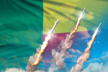 Modern strategic rocket forces concept on blue sky background, Benin nuclear missile attack - military industrial 3D illustration, nuke with flag