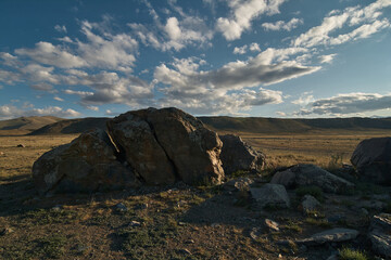 Huge stones among the steppe plain