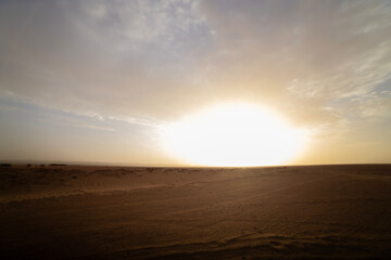 A sunrise of desert at Mhamid el Ghizlane in Morocco wide shot