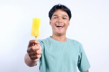 Smiling Young Asian Man Excited to Eat Ice Cream Isolated on White Background 