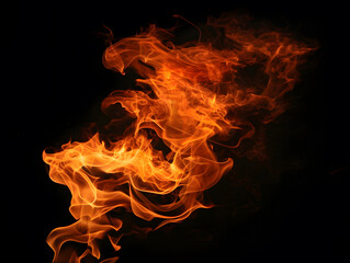 Fototapeta premium Nighttime blaze: Fiery inferno illuminates the darkness, casting warm orange hues against the black backdrop. Fiery Flames Background.
