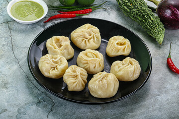 Nepali steamed dumplings  Momo with sause